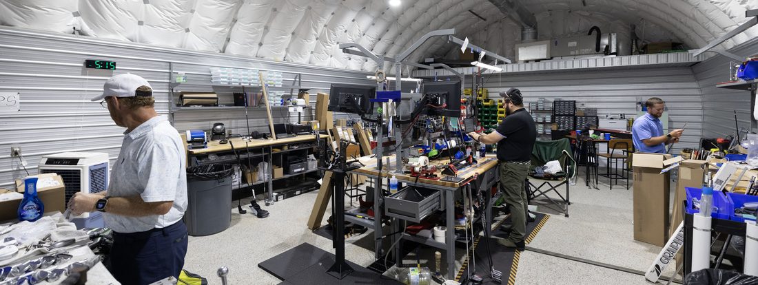 The Next Gear build shop - the team working at the build benches